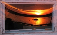 IMG_7186_Sunrise_Reflection_in_Boat_Workshop_Window_JRossman.jpg